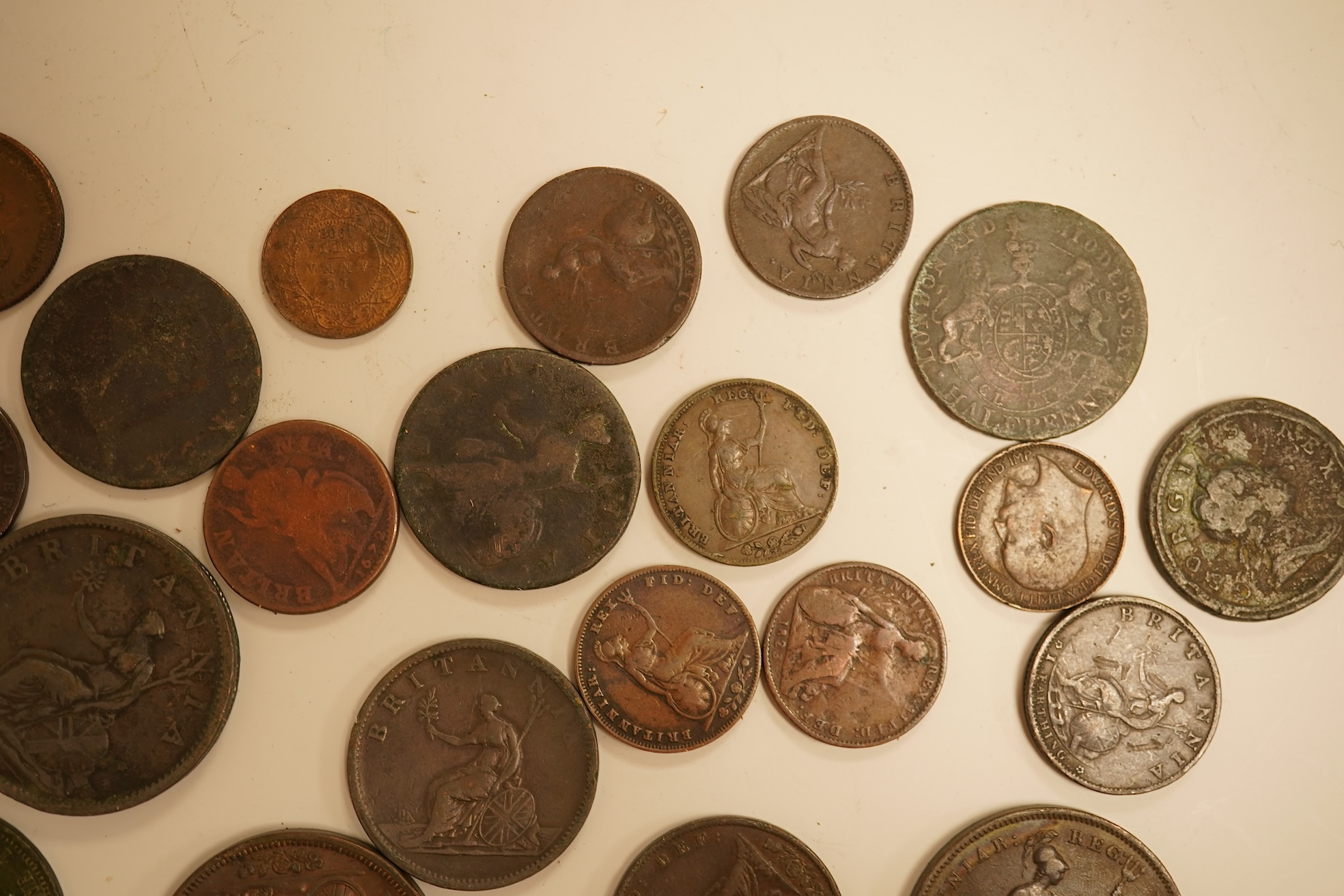 Twenty three copper coins including a William IV penny